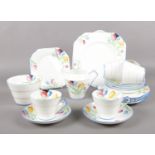 A Gladstone China art deco style part tea set. Cups/saucers, milk jug, sugar bowl, plates.