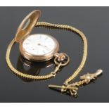 A ½ hunter gold plated pocket watch and chain, by Waltham Mass, with 15 jewel movement. In J.W.