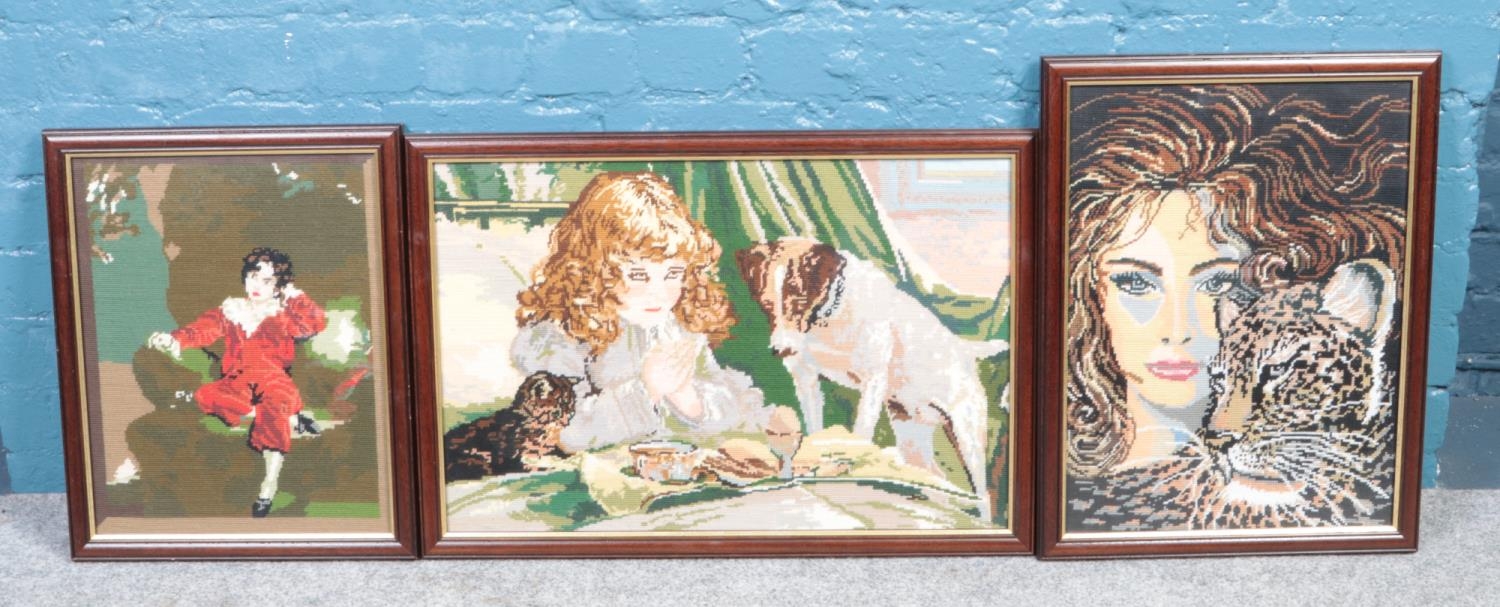 A series of three framed tapestries depicting female figures. To include young girl with dog and