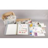 A selection of UK & World stamps and collectors tea cards. To include nine 1st day covers, an