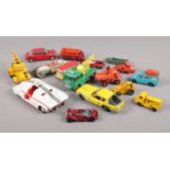 A quantity of diecast vehicles. Including Dinky Armoured Vehicle, Jensen FF, Matchbox, etc. Play