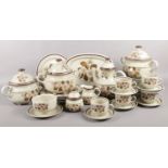 A quantity of German tea & dinner wares. cups/saucers, plates, lidded tureens etc