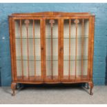 A vintage walnut glazed front bookcase/sideboard. (116cm height 116cm width)