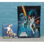 A 3D Star Wars poster and an unopened Pin-up Calendar. To include a pin-up calendar by Gil