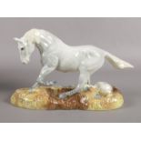 A Beswick 'Camargue Wild Horse' figure. Limited edition 227/1000, 17cm height, boxed and