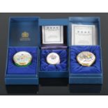 Three Halcyon Days enamel pill boxes. Complete with box, 2 with leaflets.
