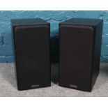 A pair of Monitor Audio speakers. serial no. 136141.