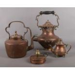 A quantity of metalwares. Vintage copper kettles, copper oil lamp base etc