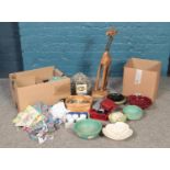 Two boxes of miscellaneous. To include a large wooden giraffe with spring head, vintage aprons, a