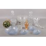 A selection of glassware. To include two cut glass decanters with stoppers, a green glass fishing