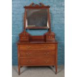 An Edwardian mahogany dressing table. With three drawer.