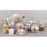A quantity of oriental and oriental style ceramic's. Vases plates and bowls etc