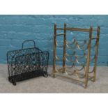 A brass three tier wine rack & magazine rack.