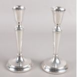 A pair of silver filled candlesticks. Assayed Birmingham 1993 by L J Millington.