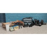 A box of assorted photographic equipment and clocks. To include Ilfordmatic Super 100, a Hahnel HC-