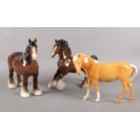 Three Beswick horse figures. (Tallest 22cm)