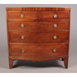 A Regency mahogany bow front chest of drawers. Height 102.5cm, Width 99.5cm, Depth 50.5cm.