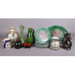 A selection of hand-made pottery. To include a Burmantofts style candlestick, Royal Winton