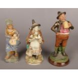 Three 19th century continental figures. Includes Bernard Bloch majolica figure with a stein.