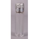A Victorian silver topped glass scent bottle. Assayed Birmingham 1899.