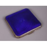 A Silver compact with guilloche blue enamel design. Assayed in Birmingham 1913. Markers mark