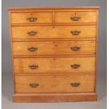 A large early 20th century Oak chest of drawers. Comprising of two over four drawers, with brass