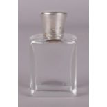 A silver topped glass scent bottle. Assayed Birmingham 1913.