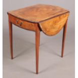 A George III satinwood Pembroke games table. Crossbanded in mahogany, with strung inlay and raised