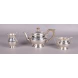 A George VI silver three piece tea set assayed Birmingham 1939. Makers mark for PT & Sons. Gross