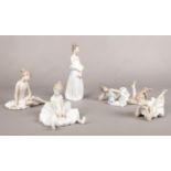 Five Nao by Lladro figurines.