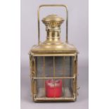 A French antique brass lantern. Bearing badge for L. Dorvaux, Paris. Height 43cm. Lacking one