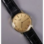 A gents Longines manual wristwatch. With baton markers and champagne dial. In box. Running.