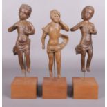 Church salvage; Three late 18th/early 19th century carved wooden clock figures. Includes a pair of