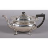 A George V silver tea pot assayed Sheffield 1915 by James Deakin & Sons. With pierced decoration and