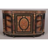 A Victorian ebonised and boulle credenza. Central door flanked by two curved glazed vitrine doors.