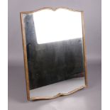 A large antique gilt framed strut mirror. 57cm x 42.5cm.