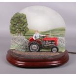 A Border Fine Arts Studio 'Dawn till Dusk' (Backlit MF35 Tractor) Lamp Base, model No. A7687.