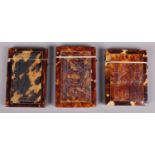 Three carved tortoise shell card cases.