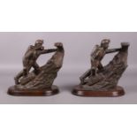 A pair of limited edition bronzed coal miner figures on plinths. Stamped for AGP 1990, numbers