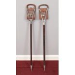 Two leather shooting sticks. To include 'The Swadeneyne' by Swaine & Adeney Ltd (185 Piccadilly,