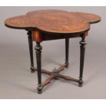 A late 19th century kingwood and marquetry quatrefoil table. Raised on tapering fluted supports.