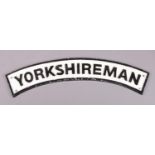 A cast iron 'Yorkshireman' sign. 65cm wide.