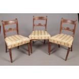 A set of five walnut dining chairs and a mahogany example. To include two carvers and three walnut