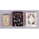 Three card cases. Includes one tortoise shell with mother of pearl inlay, abalone and mother of