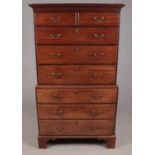 A George III mahogany and pine chest on chest. With moulded cornice and bracket feet. Height