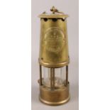 An Eccles Type 6 brass miners safety lamp.