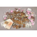 A quantity of World bank notes & coins. To include British pre- decimalisation, USA Canada
