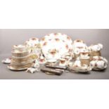 A large quantity of Royal Albert 'Old Country Roses'. Teapot, cups/saucers, side plates, large