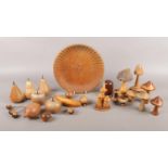 A quantity of turned and carved wooden items. To include fruit, mushrooms, acorns and a bowl. H: