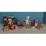 A bag of assorted vintage tins and a musical teddy bear. To include OXO, Jacksons of Piccadilly,